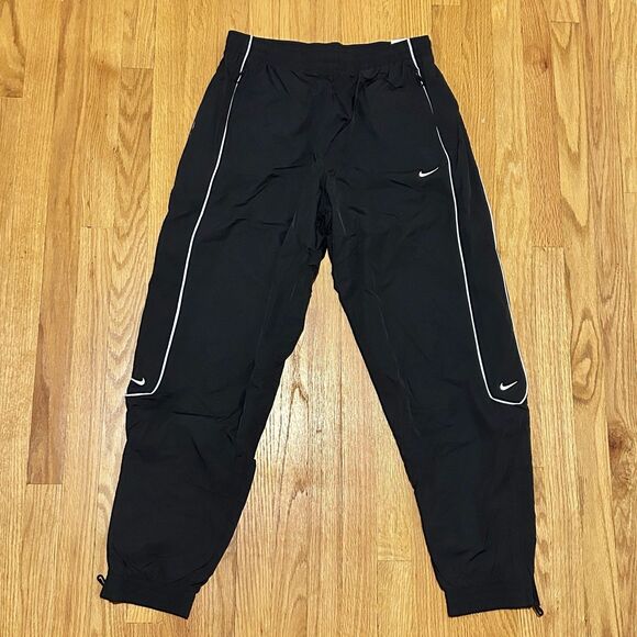 Nike Solo Swoosh Men’s Size M Black White Nylon Tapered Lifestyle Track Pants - Picture 2 of 8